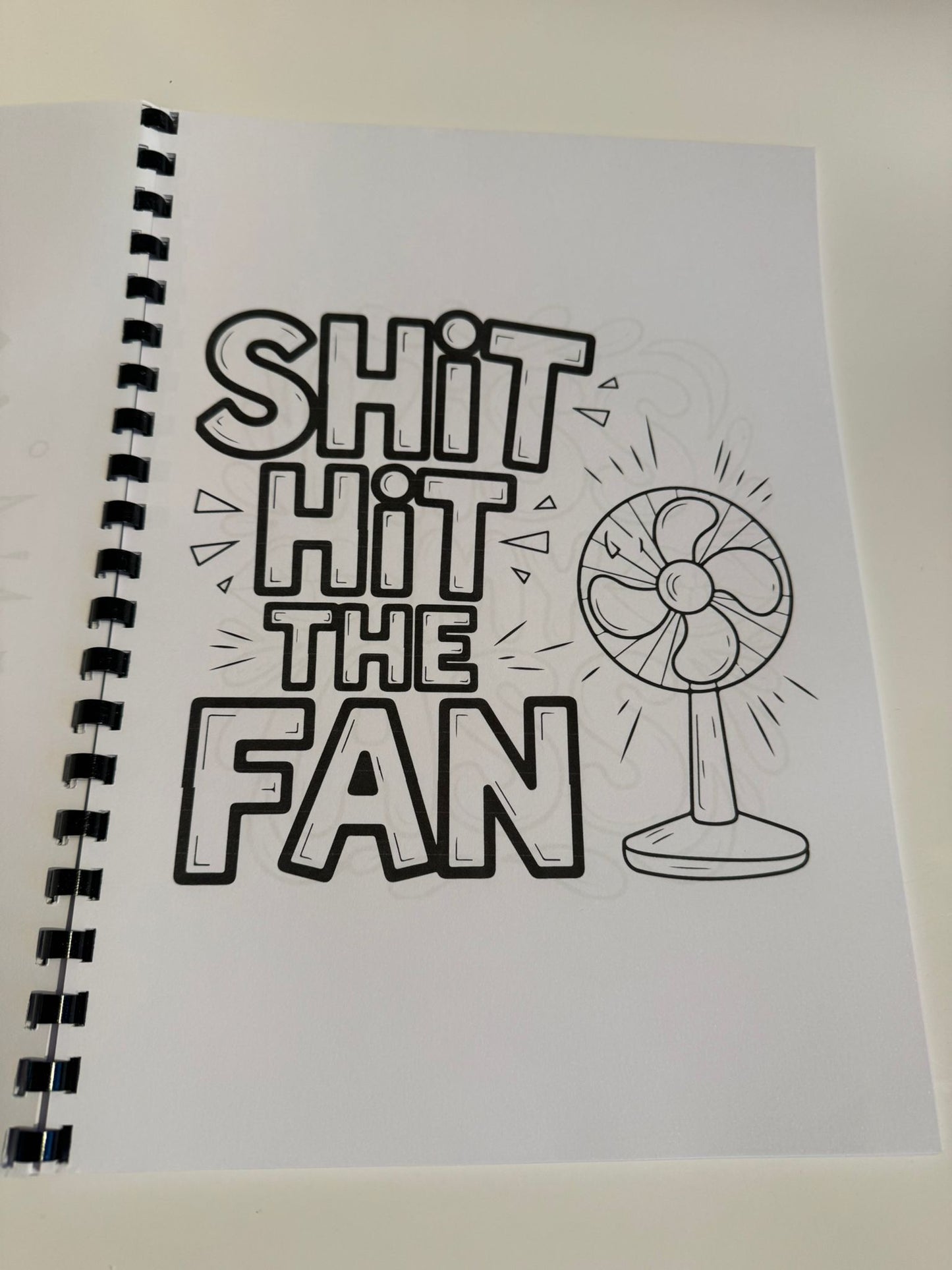 Swearing colouring book with thick 120 gsm paper, plastic comb, card back cover, plastic film and glossy front cover