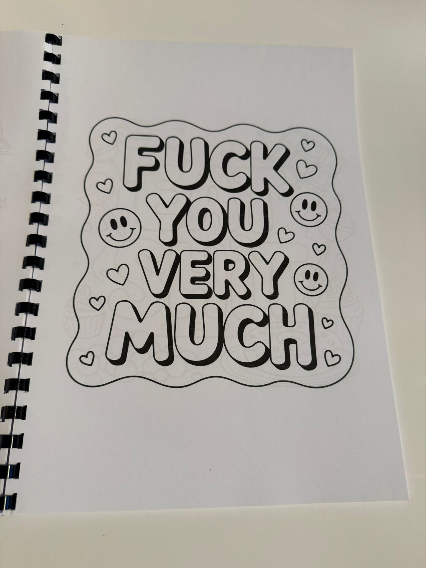 Swearing colouring book with thick 120 gsm paper, plastic comb, card back cover, plastic film and glossy front cover