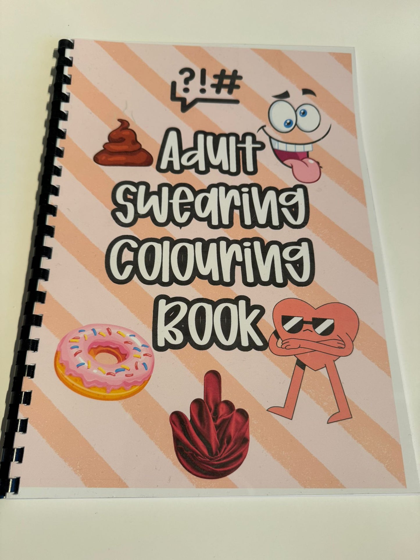 Swearing colouring book with thick 120 gsm paper, plastic comb, card back cover, plastic film and glossy front cover
