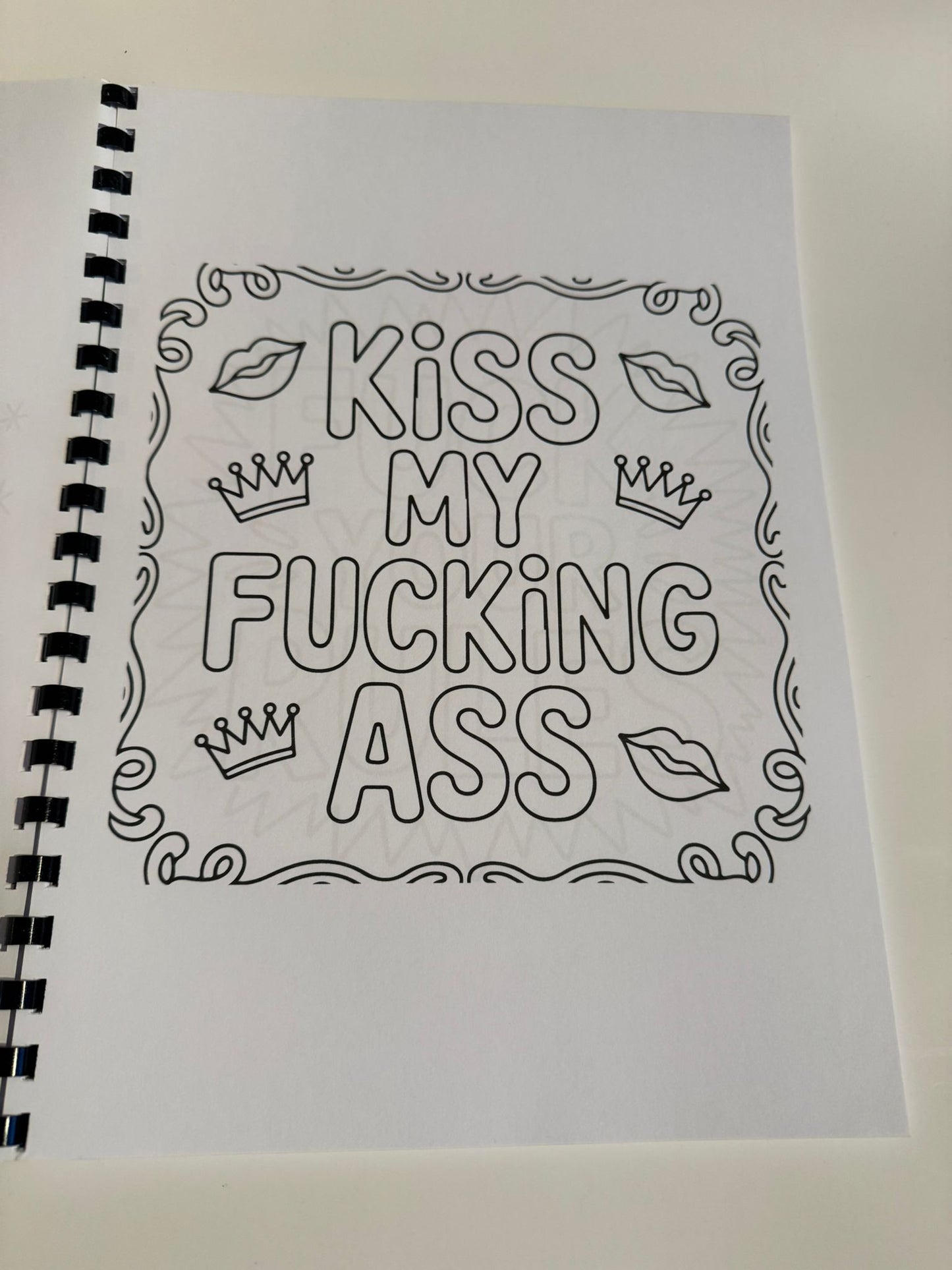 Swearing colouring book with thick 120 gsm paper, plastic comb, card back cover, plastic film and glossy front cover